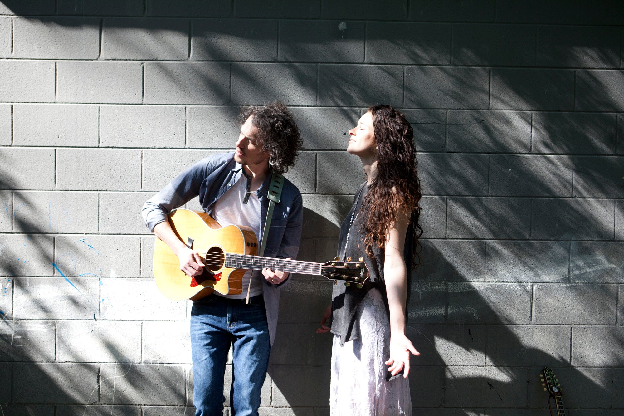 Molly and Patrick Lockwood Sunshine on Brick Wall